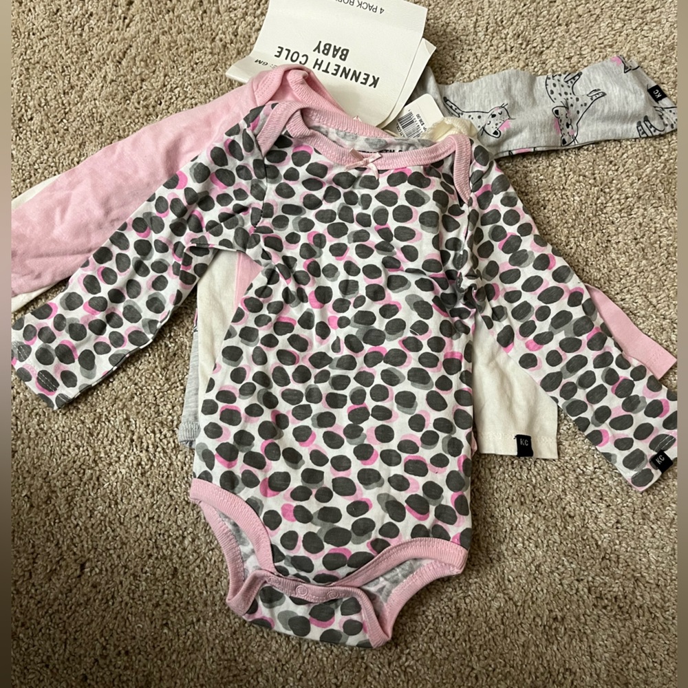 Set of 3 6 month onesies. Brand New